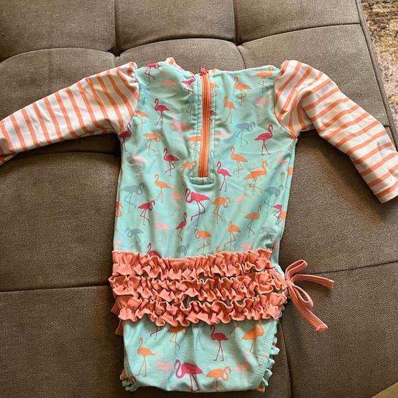 Ruffle butts swim 6-12 months. Mild piling only on bottom. - Picture 2 of 2